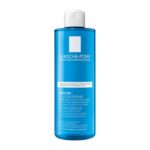Ένα μπλε μπουκάλι 400 ml σαμπουάν La Roche Posay Kerium Extra Gentle Gel διαθέτει ένα λευκό καπάκι και μια ετικέτα που περιγράφει την απαλή σύνθεσή του.