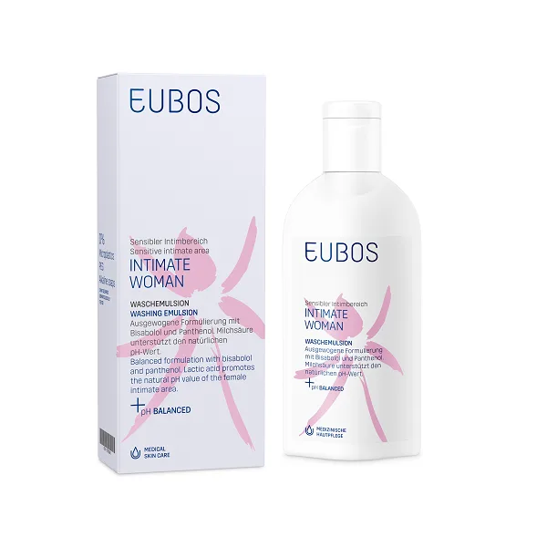 Ένα μπουκάλι Eubos Intimate Woman Washing Emulsion 200 ml στηρίζεται δίπλα στο λευκό κουτί του, διακοσμημένο με ντελικάτες ροζ και μοβ τόνους.