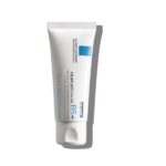 Λευκό σωληνάριο La Roche Posay Cicaplast Baume B5+ 40 ml με μπλε προφορά και κείμενο, που παρουσιάζει τη φόρμουλα cicaplast baume b5+ σε παρθένο λευκό φόντο.