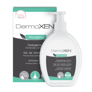 Ένα μπουκάλι Dermoxen Intimate Cleanser Proneem 200ml με τη συσκευασία του προϊόντος να εμφανίζεται με χάρη στο φόντο.