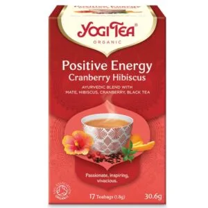 Κουτί Yogi Tea Θετικής Ενέργειας Cranberry Hibiscus 30,6 g με εικόνα ενός αχνιστού φλιτζανιού και ζωηρά floral διακοσμητικά.