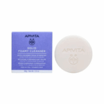 Apivita Solid Foamy Cleanser Face & Eyes 80 g Ένα Apivita Solid Foamy Cleanser Face & Eyes 80 g βρίσκεται δίπλα στο μωβ και λευκό κουτί του.