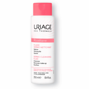 Uriage Roseliane Dermo Cleansing Fluid 250 ml σε λευκό και ροζ μπουκάλι, ειδικά σχεδιασμένο για ευαίσθητες επιδερμίδες.